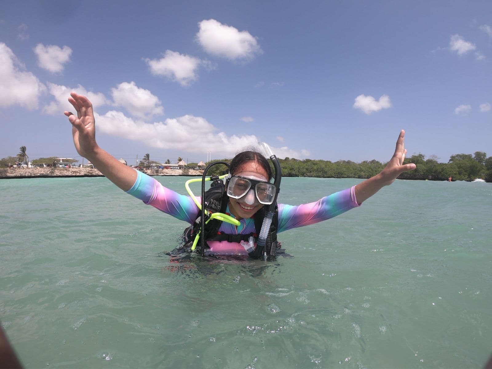 Kid snorkeler in shallow water